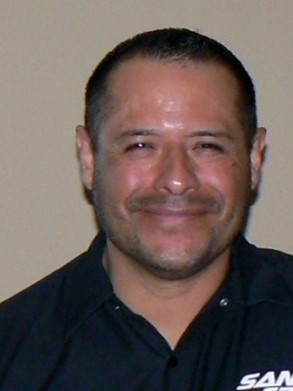 man with black polo shirt 